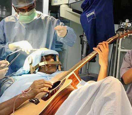 man-plays-guitar-during-brain-surgery