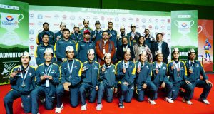 CM Pushkar Singh Dhami with medal winners and volunteers at 38 national games