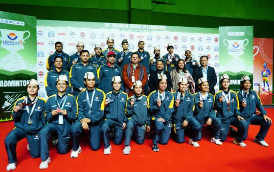 CM Pushkar Singh Dhami with medal winners and volunteers at 38 national games