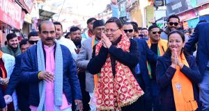 CM Dhami road show with Mayor candidate Kalpana Devlal