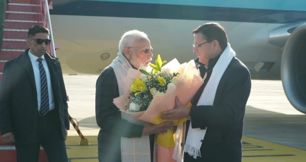 CM Dhami receives PM Modi at Airport