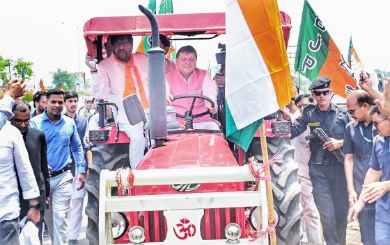 CM Pushkar Singh Dhami driving tractor