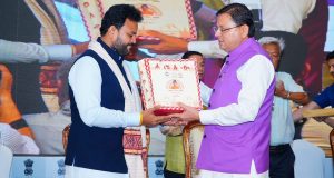 CM Dhami welcoming Union civil aviation minister Kinjarapu Ram Mohan Naidu