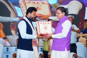 CM Dhami welcoming Union civil aviation minister Kinjarapu Ram Mohan Naidu