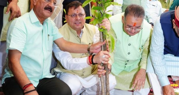 CM Pushkar Singh Dhami planting a sapling on Harela