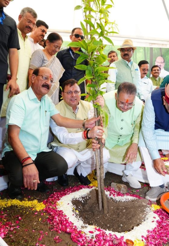 CM Pushkar Singh Dhami planting a sapling on Harela