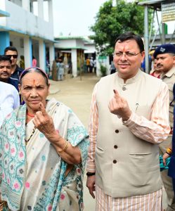 CM Dhami along with his mother cast their vote in Khatima for Panchayat election